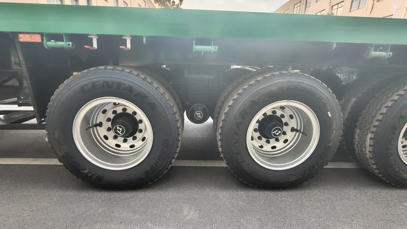 80 Ton 4 Axle Heavy Duty Flatbed Semi Trailer for Cargo Transport