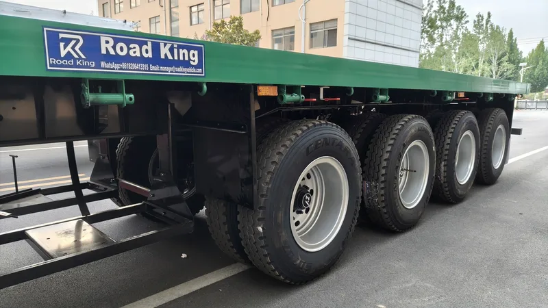 80 Ton 4 Axle Heavy Duty Flatbed Semi Trailer for Cargo Transport