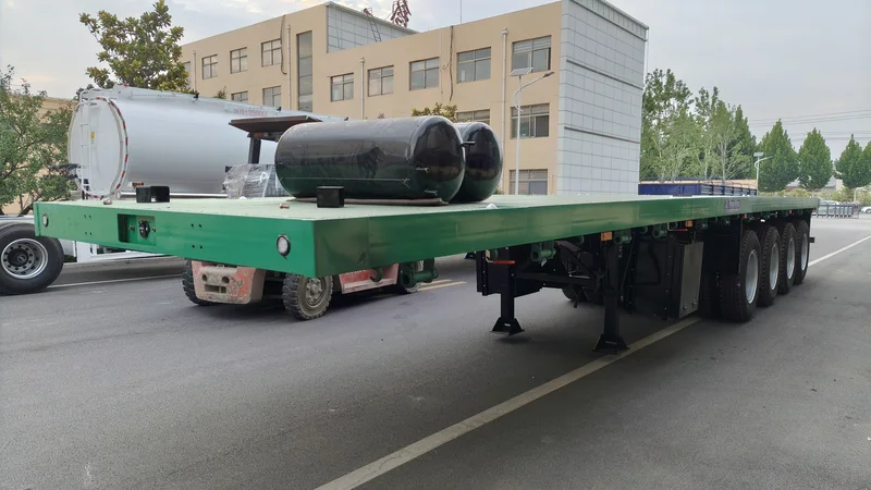 80 Ton 4 Axle Heavy Duty Flatbed Semi Trailer for Cargo Transport